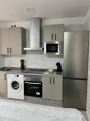 Una cocina o zona de cocina en Apartamento El Rincón del Olivar III