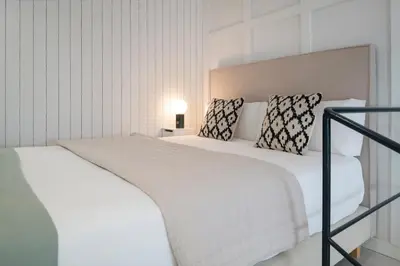 Cama o camas de una habitación en Magno Apartments Plaza San Gil