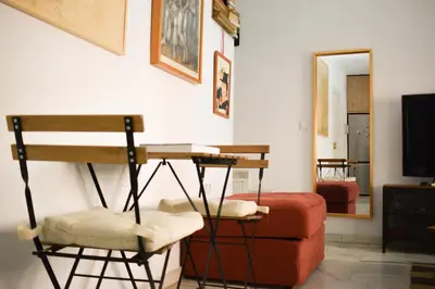Zona de estar de Hostfy Centro, Bustos Tavera