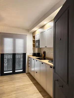 Una cocina o zona de cocina en Apartamentos Casa Miguel
