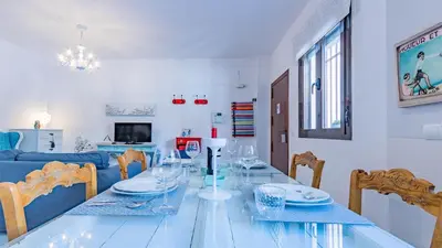 Una televisión o centro de entretenimiento en Apartamento Corredera Living Córdoba