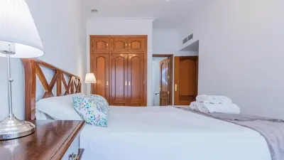 Cama o camas de una habitación en Vive Córdoba Apartamento junto a Estación y Centro