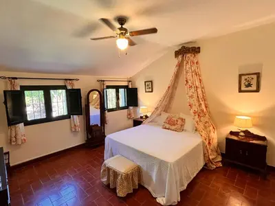 Cama o camas de una habitación en Casa rural Cortijo el Chamorro