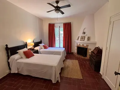 Cama o camas de una habitación en Casa rural Cortijo el Chamorro