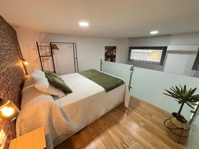 Cama o camas de una habitación en Jaén Interior LOFT