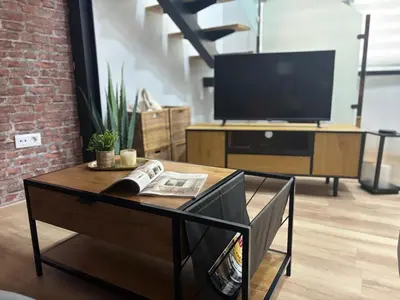 Una televisión o centro de entretenimiento en Jaén Interior LOFT