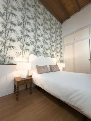 Cama o camas de una habitación en MonKeys Apartments Castellar & Suite