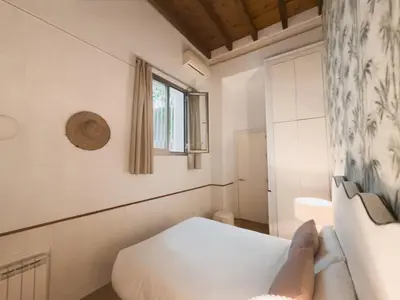 Cama o camas de una habitación en MonKeys Apartments Castellar & Suite
