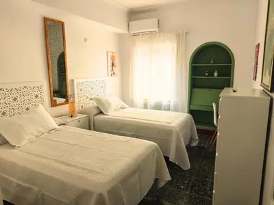 Cama o camas de una habitación en Ronda Suite, Parking gratuito cercano
