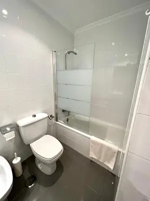 Un baño de Charming abode