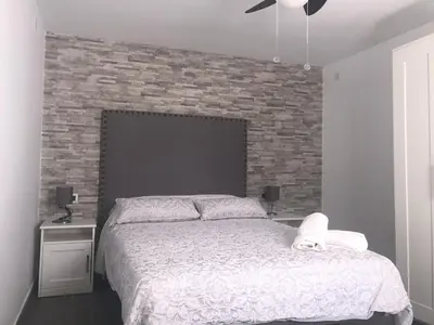 Cama o camas de una habitación en Modern One bed apartment, Ardales Lakes and Caminito del Rey