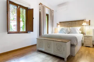 Cama o camas de una habitación en Alohamundi Judería II - Amazing house 3 terraces&views