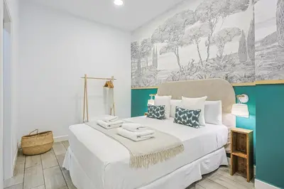 Cama o camas de una habitación en Sevilla Legacy Santa Justa