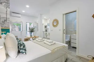 Cama o camas de una habitación en Sevilla Legacy Santa Justa