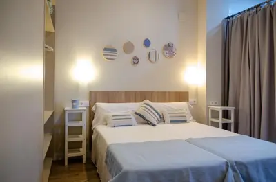 Cama o camas de una habitación en Loft CELINDA y Loft FRESIA