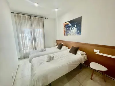 Cama o camas de una habitación en Geysotur Alcántara