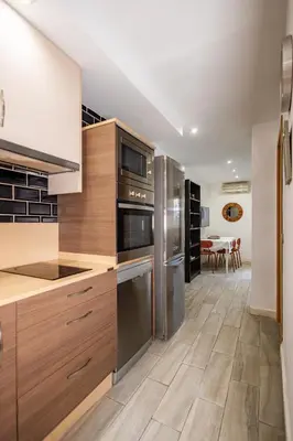 Una cocina o zona de cocina en Acogedor Piso de 2 Dormitorios en Sevilla