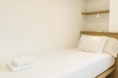 Cama o camas de una habitación en RentalSevilla Hiniesta