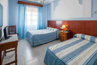 Cama o camas de una habitación en Hotel Restaurante Los Molinos