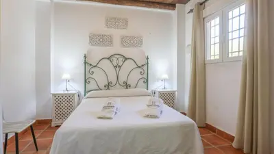 Cama o camas de una habitación en La Era del Bonete Constantina by Ruralidays