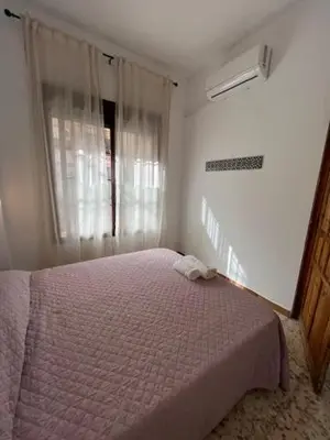 Cama o camas de una habitación en Santa Ana en pleno centro cerca de Sevilla