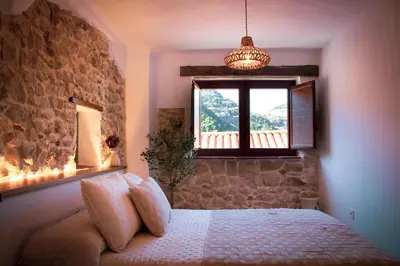 Cama o camas de una habitación en El Charcon Alojamiento Rural