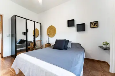 Cama o camas de una habitación en MalagaSuite Cortijo Segura