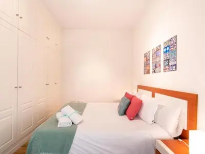 Cama o camas de una habitación en 1 Dorm Elegante en la Sevilla más autentica