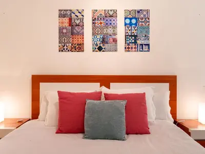 Cama o camas de una habitación en 1 Dorm Elegante en la Sevilla más autentica