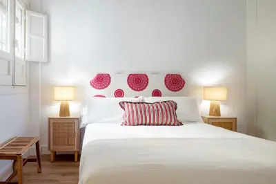 Cama o camas de una habitación en Magno Apartments San Bernardo