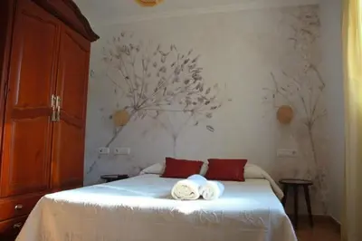 Cama o camas de una habitación en Hostal Boutique El Rey del Sol
