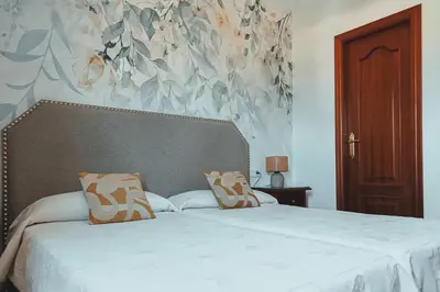 Cama o camas de una habitación en Hostal Boutique El Rey del Sol
