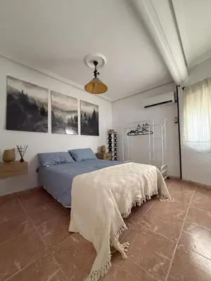 Cama o camas de una habitación en La Casita del Coso