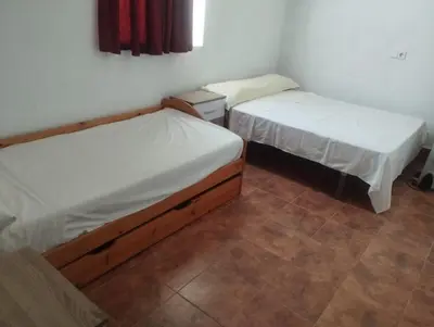 Cama o camas de una habitación en Casa Rural El Olivar