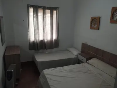 Cama o camas de una habitación en Casa Rural El Olivar
