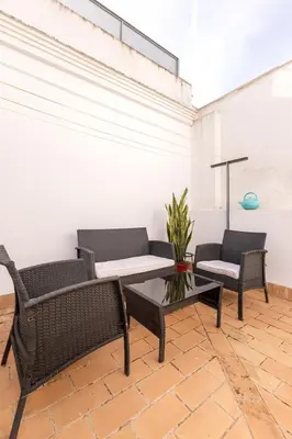 Zona de estar de San Luis Duplex Center by Valcambre
