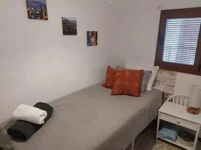 Cama o camas de una habitación en Casa Chumba - Stunning terraces in the heart of Alora