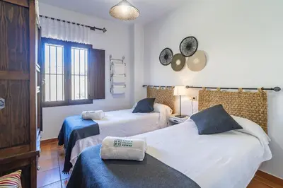 Cama o camas de una habitación en Cubo's Casa Rural Cortijo El Puntal