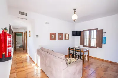 Una televisión o centro de entretenimiento en Cubo's Casa Rural Cortijo El Puntal