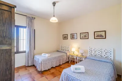 Cama o camas de una habitación en Cubo's Casa Rural Cortijo El Puntal