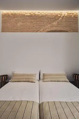 Cama o camas de una habitación en Alameda. Jesus del Gran Poder