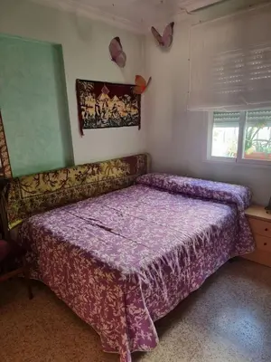 Cama o camas de una habitación en Apto Templo de Isis, Habitación Verde en Amate
