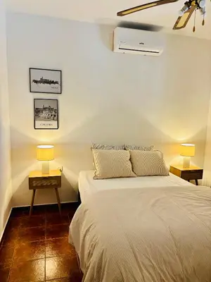 Cama o camas de una habitación en La Mimosa, beautiful villa with swimming pool and sea view