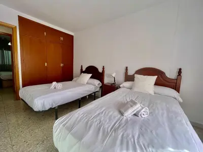 Cama o camas de una habitación en Geysotur Guadalrio
