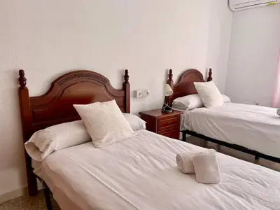 Cama o camas de una habitación en Geysotur Guadalrio