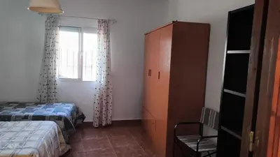 Cama o camas de una habitación en Apartamento en Cazalla de la Sierra