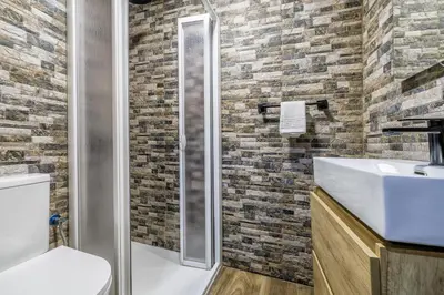 Un baño de Brisa del Sur Apartamento