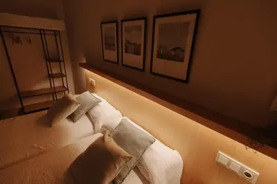 Cama o camas de una habitación en Hotel Asador Las Viñas