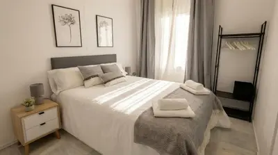 Cama o camas de una habitación en Brand-New 2BR Apt Near Center - FREE Parking