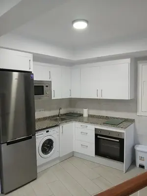 Una cocina o zona de cocina en Apt isabel